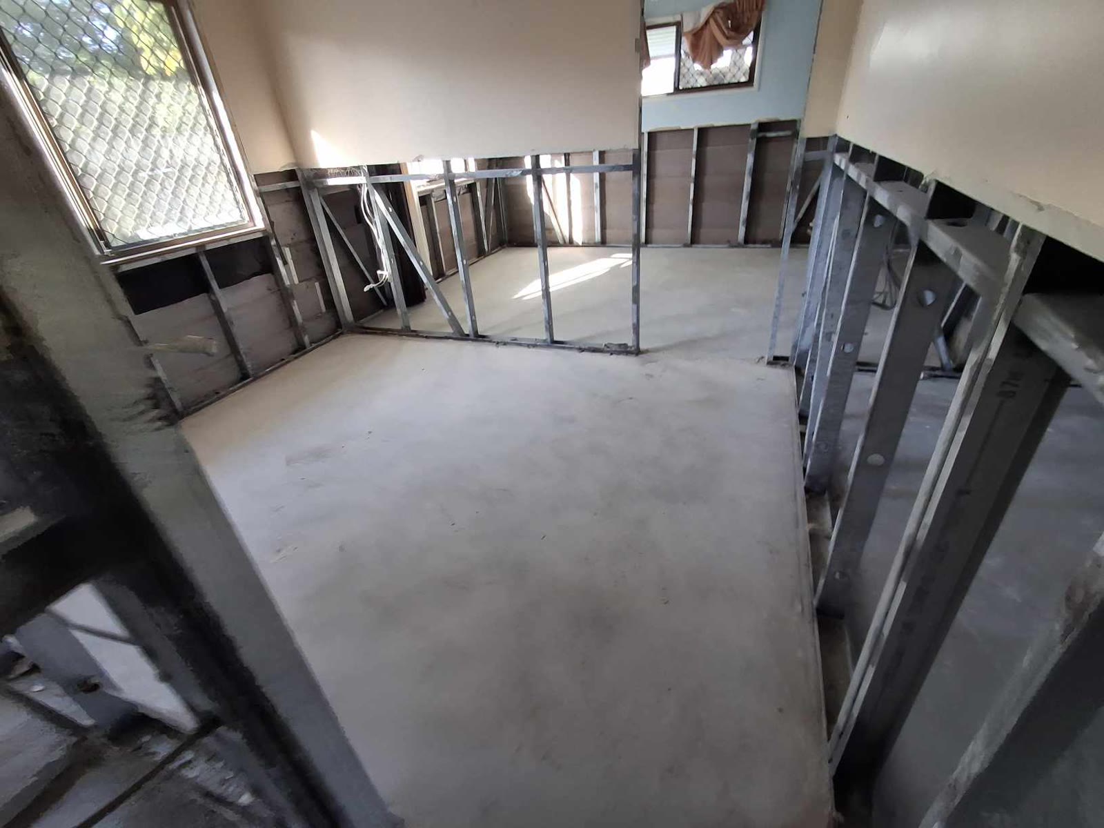 Open-plan flood strip-out — mould remediation and strip-out Brisbane for homeowners, insurance builders and insurers