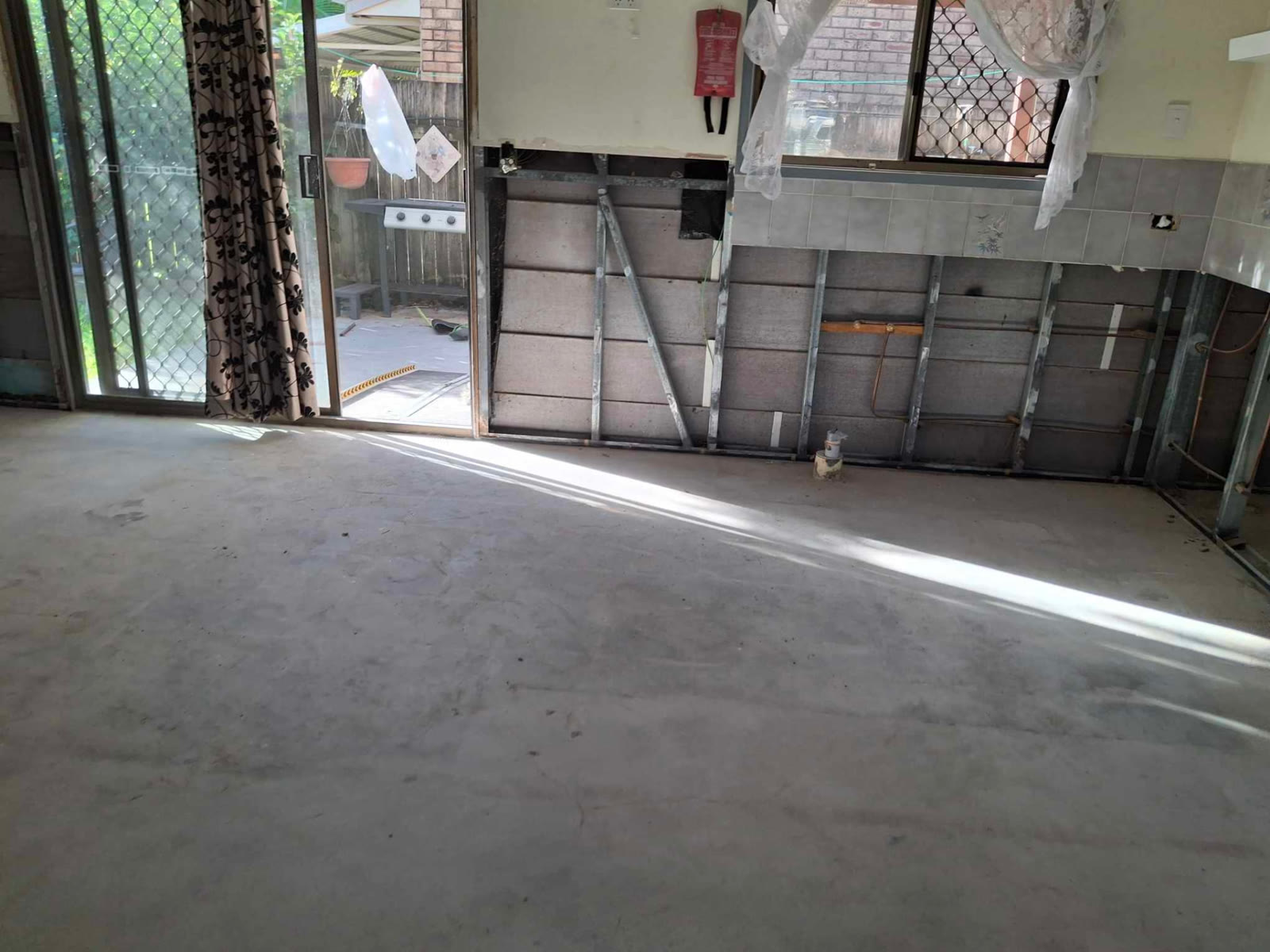 Living room strip-out — mould remediation and strip-out Gold Coast for homeowners, insurance builders and insurers
